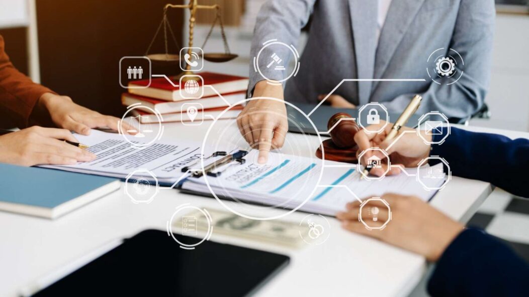 Legal team reviewing compliance documents for IT professional agency investigation defense strategy