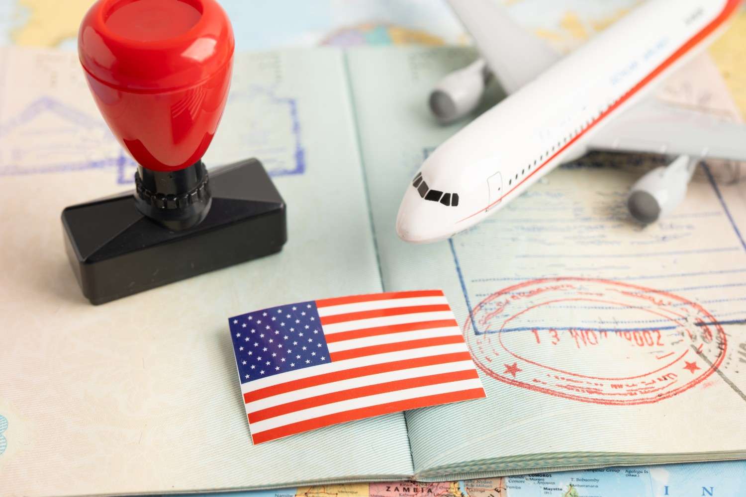 U.S. immigration enforcement concept showing passport stamp, airplane, and DHS deportation process for unauthorized stays