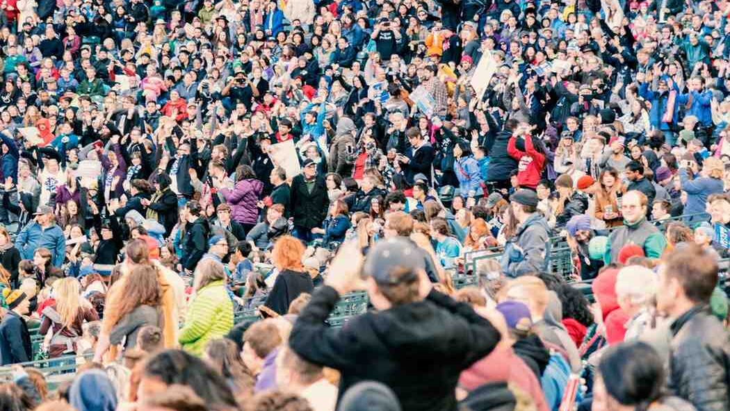Large crowd attending U.S. naturalization ceremony celebrating new citizens on Citizenship Day