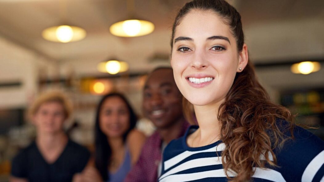 F-1 international student on STEM OPT with peers exploring post-graduation visa pathways