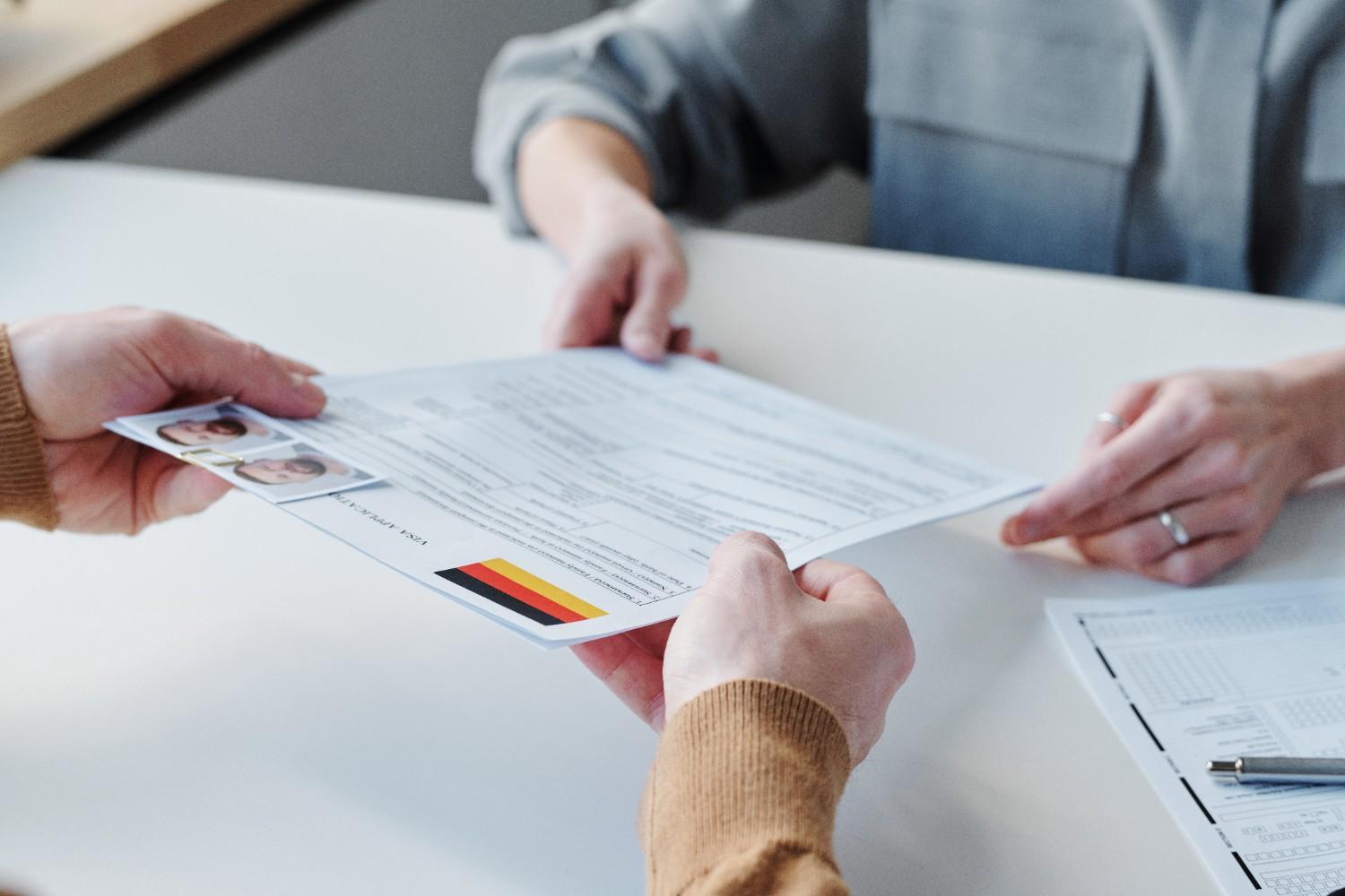 Submitting immigration visa application documents illustrating unused immigrant visas and visa cap process