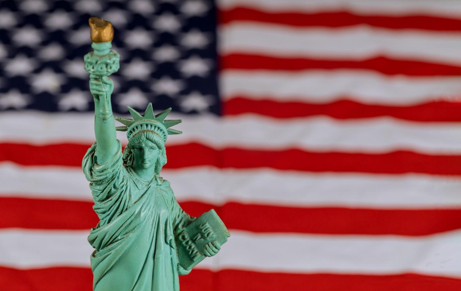 Statue of Liberty representing USCIS immigration policy updates and the 2024 CIS Ombudsman Report to Congress