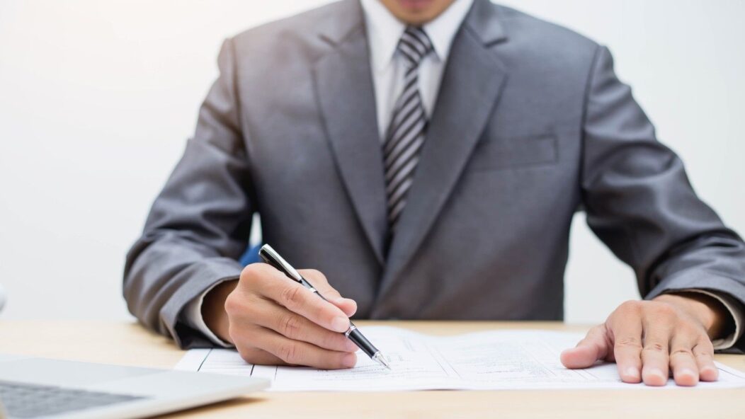 Employer completing USCIS Form I-9 to verify employee work authorization and employment eligibility