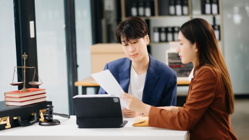 An employer consulting with an immigration expert about the PERM process, highlighting strategies to avoid delays and ensure compliance.