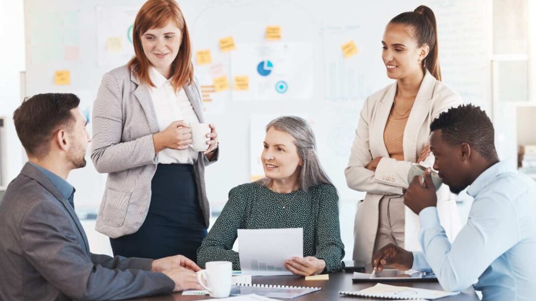 Immigrant worker holding I-485 application with Employment Authorization Document (EAD) while considering job change during green card process.