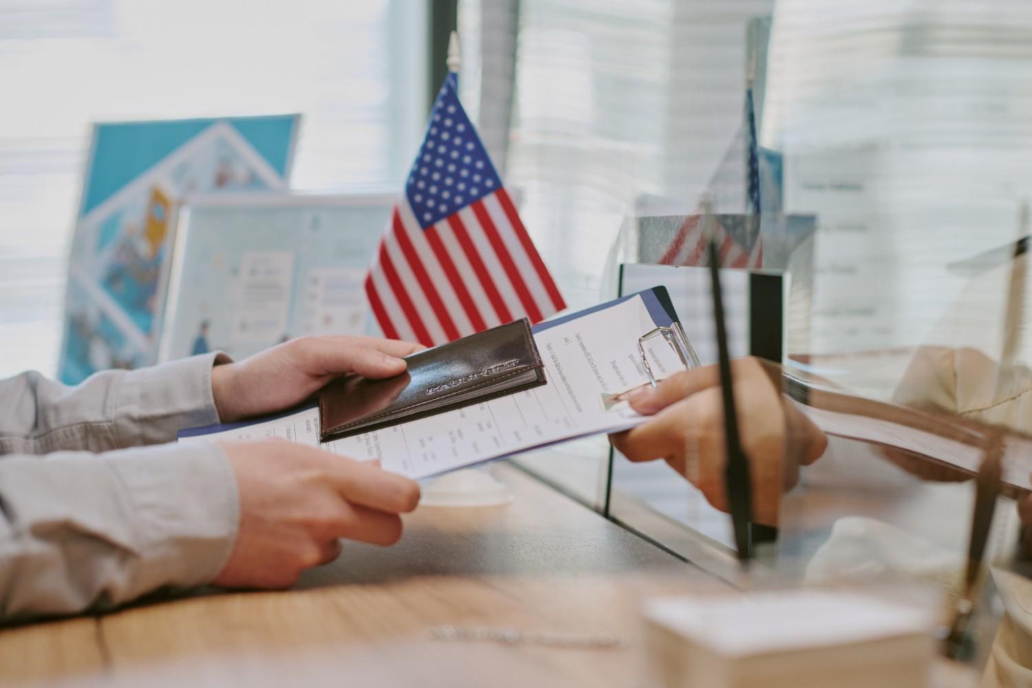 Young professional with a passport and travel bag, symbolizing TN Visa opportunities in 2025.