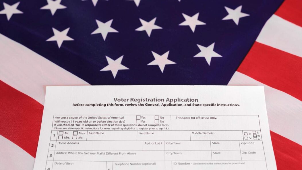 Person holding Form I-134A, which has been temporarily paused due to the 'Securing Our Borders' executive order, affecting immigration support.