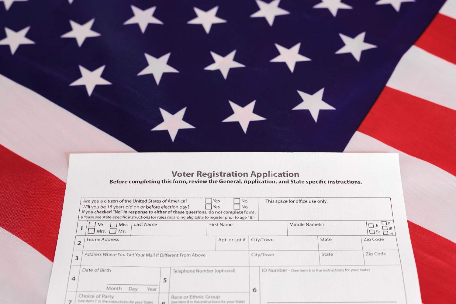 Person holding Form I-134A, which has been temporarily paused due to the 'Securing Our Borders' executive order, affecting immigration support.
