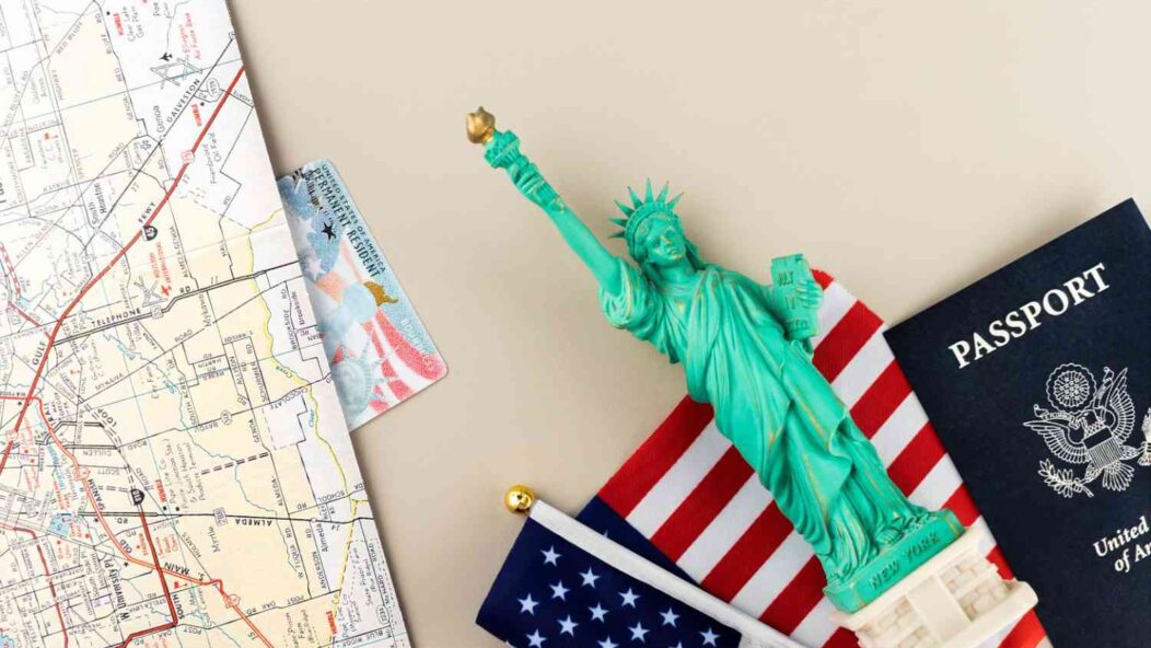 US Visa Trends India 2025: Statue of Liberty, American Flag, Passport, and Map Representing Travel and Immigration.