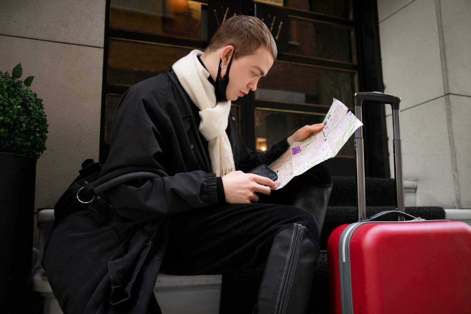 Traveler reviewing map while preparing for smooth entry into the U.S. with legal representation.