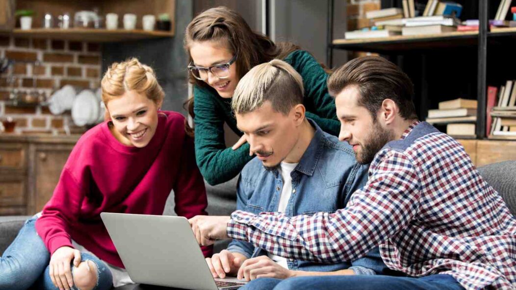 International students discussing F1 visa entry requirements with the U.S. flag in the background, ensuring smooth immigration processing.