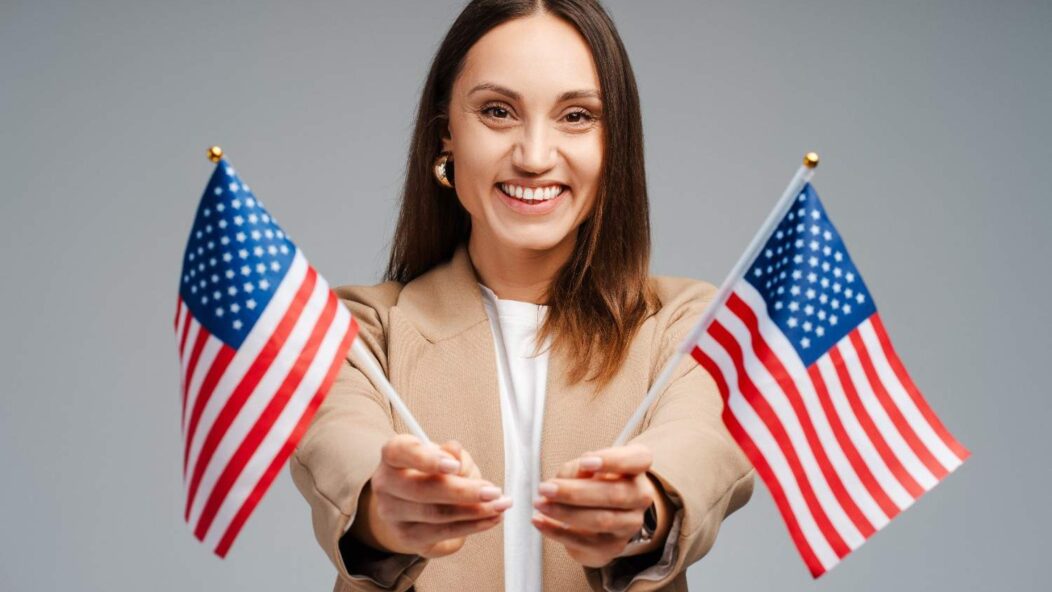 Woman reviewing documents at a US consulate, concerned about visa processing delays