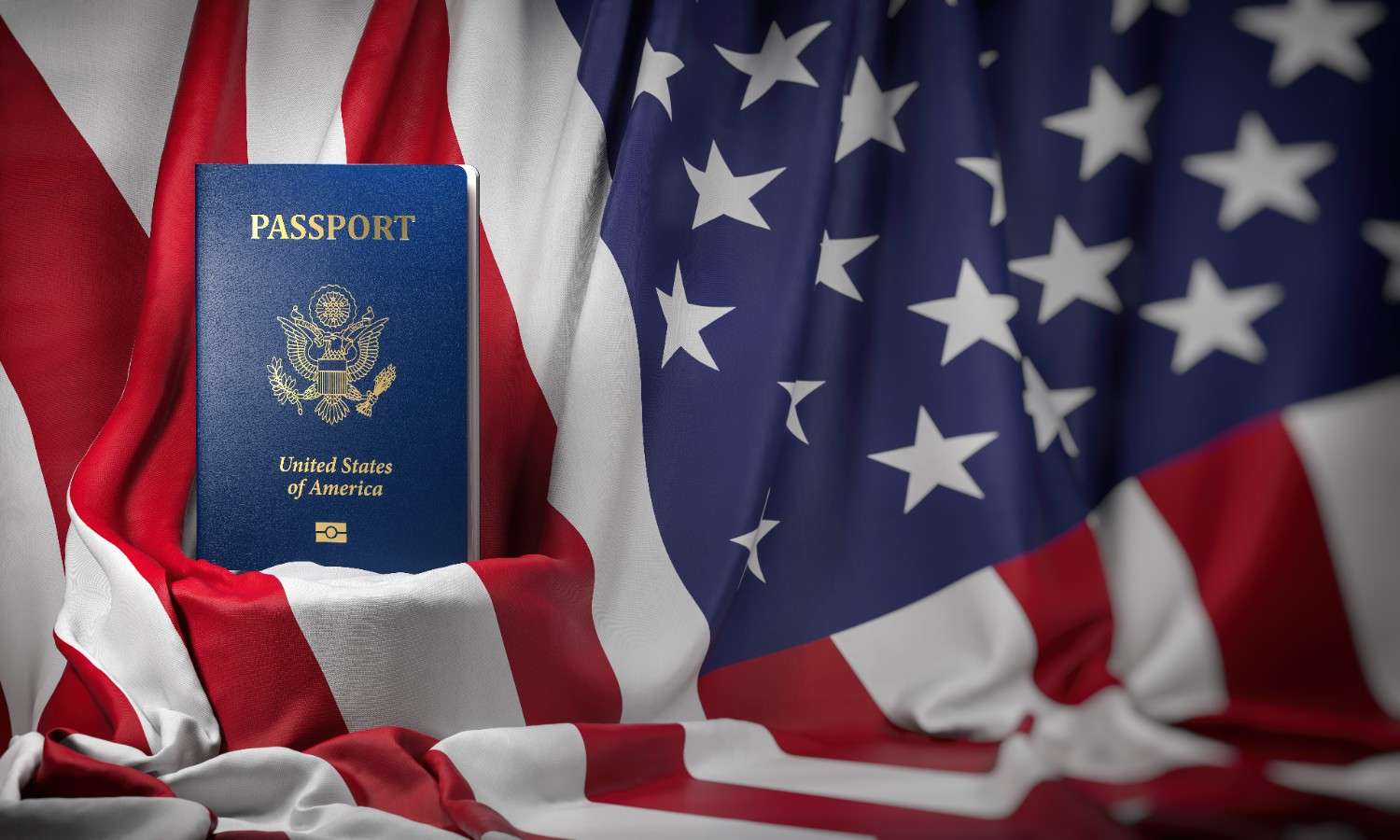 Green card, U.S. passport, and Statue of Liberty on an American flag representing U.S. immigration and Form I-9 updates.