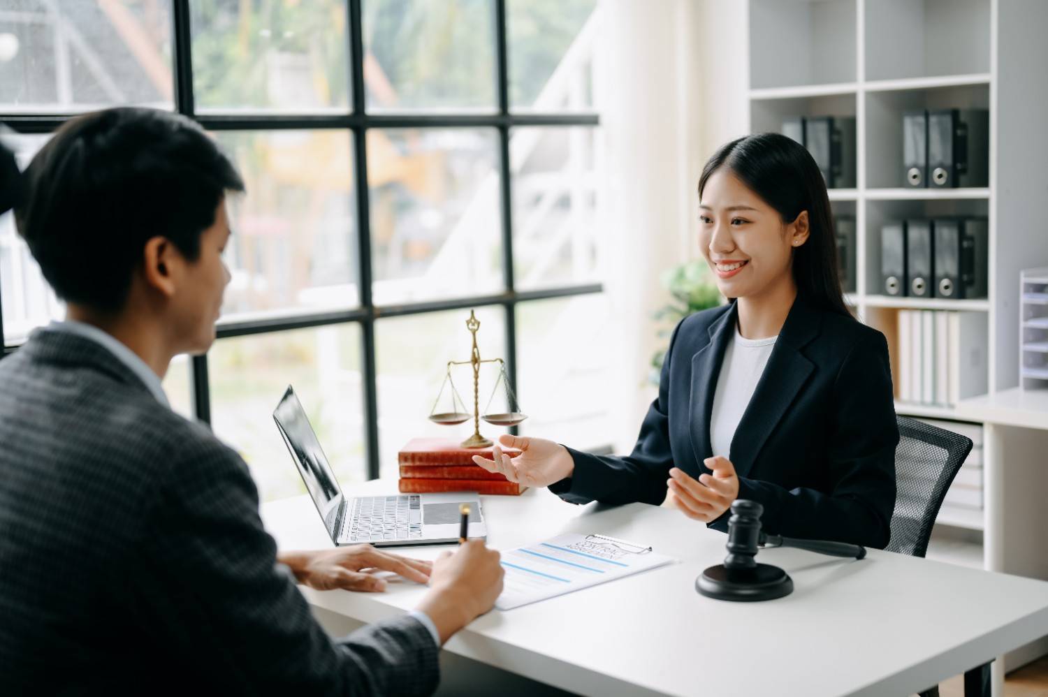 Immigration attorney support during legal consultation in office
