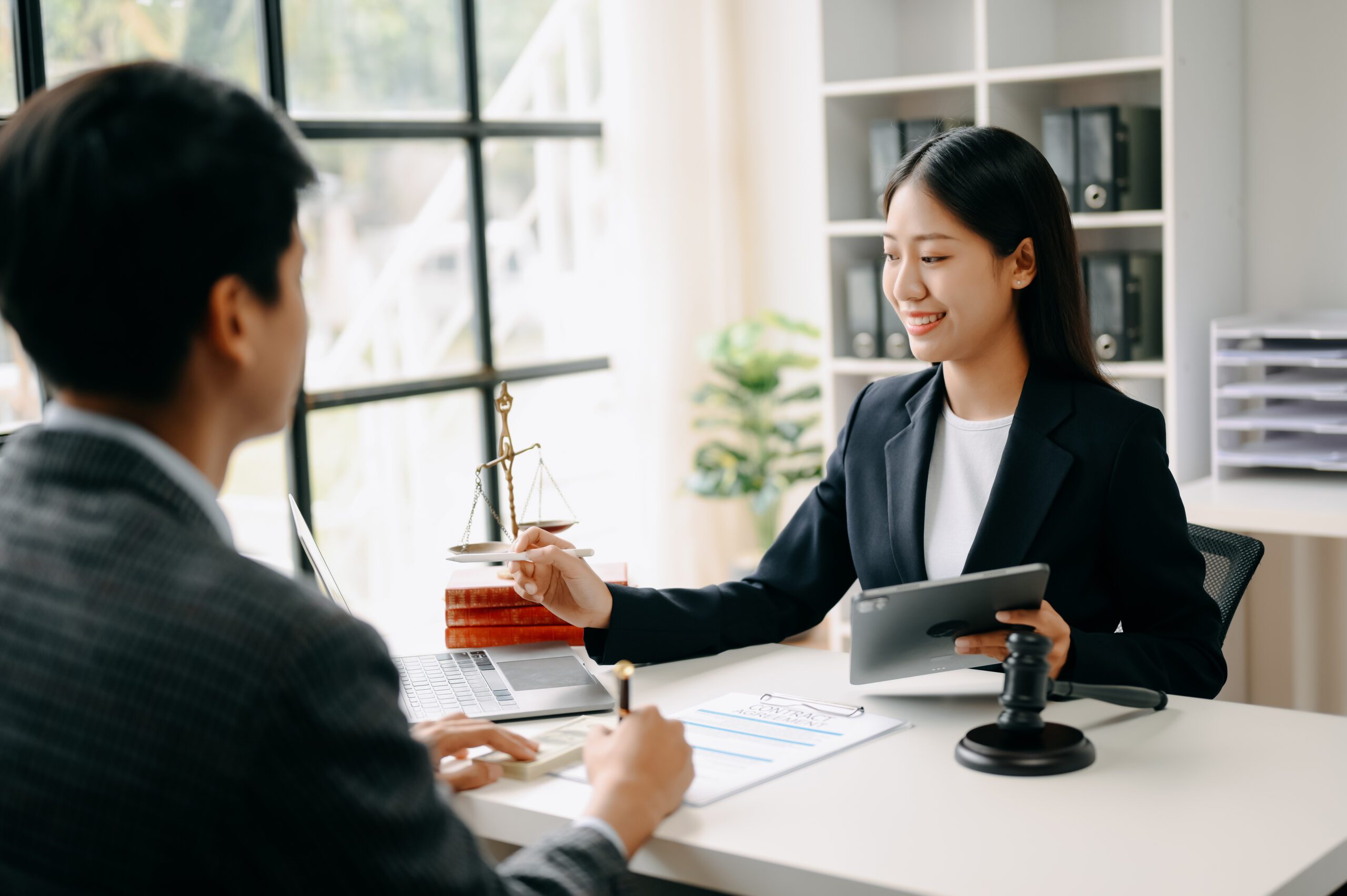 Immigration attorney support during legal consultation in office