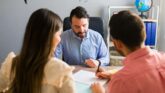 Immigration lawyer near me helping couple with visa paperwork